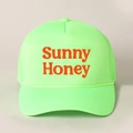 Neon green Sunny Honey trucker hat with orange print and breathable mesh design - Adjustable / Fluorescent Green
