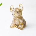 Bulldog resin statue with golden flakes and amber crystals on white background - Rutilated Quartz