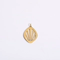Macro view of gold plated shield pendant with zircon eyes and hollow metal design - Ray Pendant 24*32mm