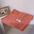 Detail view of orange cotton linen scarf with soft fringes and authentic woven label - 180*90CM / Orange Patchwork