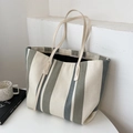 Minimalist tote bag with vertical cream and olive green stripes in durable canvas - White and Green Stripe