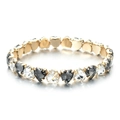 Detail view of heart-shaped zircon bracelet with gold plating and alternating crystals - Transparent & Smoke Grey