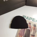 Classic black ribbed knit beanie with turn-up cuff and cozy bear embroidery detail - One Size / Solid Black