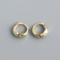 Minimalist twisted golden S925 silver hoop earrings presented as a pair on grey background - 925 Silver / Gold Color (Pair)