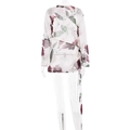 Detail van de transparante chiffon mouw met rode en groene bloemenprints erop - S / Wit Bloemen