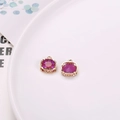 Purple mocha crystal pendant with golden hollow lace nest setting and hanging loop - Fuchsia