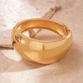 Macro view of wide gold irregular metal cuff bracelet on a natural marble background - Mirror Wide Style (HB3412-Gold) / Gold