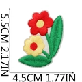 Close-up of floral embroidery patch with red and yellow flowers and dimensions - Bicolor Flowers (12)