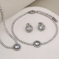 Silver stainless steel jewelry set featuring round crystal necklace, bracelet, and studs - Silver Round