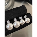 Elegant minimalist white pearl stud earrings with sparkling cubic zirconia accents - 14mm / Bright White