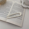 Forcina a U color bianco crema opaco su pagina di libro per acconciature vintage - Bianco