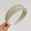 Detail of beige linen headband with double-row rhinestone edges and silver claw setting - Beige