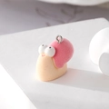 Cute pink flocked snail pendant accessory with silver metal ring on white background - Snail
