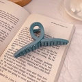 Large matte blue hair claw clip for women placed on a book, Morandi style hair accessory - 11cm / Matte Blue