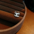 Macro shot of a silver double-layer ring with baguette-cut zircons in a brown jewelry box - H Letter Style (1# Ear Cuff-Silver-Single)