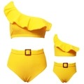 Flat lay of yellow one-shoulder bikini sets for mother and child with buckle belts - S / Yellow