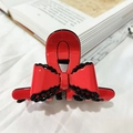Elegant red acetate hair claw clip with black lace bow detail for a vintage hairstyle - Red & Black