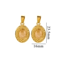 Golden oval pendant earrings with peach stone center measuring 23.5mm by 16mm - Rose Quartz