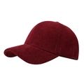 Detailed view of the dark red corduroy fabric texture on a warm baseball cap - Burgundy