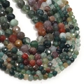Macro detail of faceted natural moss agate stone beads for DIY jewelry making - India Agate