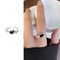 Adjustable silver ring with black faceted gemstone and liquid metal lava texture - 238 Claw