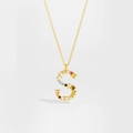 Close-up of golden letter S pendant with vibrant multi-colored gemstones on a fine chain - Gold Letter S