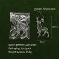 Transparent reindeer Christmas ornament with silver lanyard, size 100mm by 67mm - Lucky Deer / 100mm