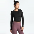 Schwarzes Langarm-Fitness-Croptop für Damen mit stilvollem Überkreuz-Detail - S / Schwarz
