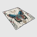Detail of bohemian flannel blanket with moon and butterfly print and black stitched edges - Colorful Butterfly Astrology