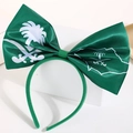 Detail of green satin bow headband with Saudi Arabian national emblem and map pattern - Saudi Arabia Flag