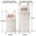 White cat shaped silicone retractable pencil case in folded and extended heights - Cat Straight