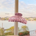 Large acetate hair claw clip featuring red and white speckled pattern in glossy finish - Strawberry Milk Fruit