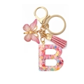Portachiavi lettera B in resina rosa con glitter a cuore, farfalla e nappina rosa - Lettera B