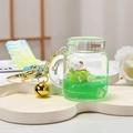 Lucky cat oil-filled shaker keychain with green liquid sand and gold bell charm - Lucky Cat with Strap (Green)