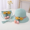 Detail of light blue straw sun hat and matching bag with pink cherry accents and bow - Kids 54cm / Hat + Bag Set / Mint Green