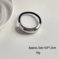 Minimalist elastic hair tie with curved silver metal piece and black rope detail - Single Smooth Bar Silver