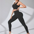 Set yoga a due pezzi nero a costine con leggings a vita alta e reggiseno sportivo - S / Nero