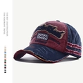 Detail of vintage washed baseball cap featuring distressed holes and 1969 embroidery - Adjustable / Navy Burgundy Patchwork (1969 Style)