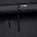 Black plated 9mm Figaro chain bracelet for men and women on dark leather background - 9mm-18cm / Black