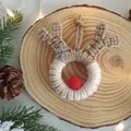 Handmade crochet Christmas reindeer ornament with brown yarn and red plush nose decor - Red White Reindeer