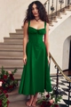 Detail of dark green midi dress featuring a pleated bust and corset waist design - S / Bottoms / Retro Dark Green