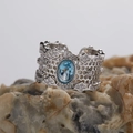 Elegant S925 sterling silver ring with oval blue gemstone and honeycomb hollow detailing - Topaz Honeycomb Hollow Style (LR240)