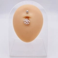 Silver flower belly button ring with clear zircons on a realistic skin model - Silver Flower