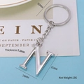 Polished silver metal letter N keychain pendant made of zinc alloy with smooth finish - Letter-N