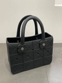 Large black EVA tote bag with geometric triangle pattern and floral rivet details - Black