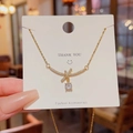Strik hanger ketting in 18K goud met sprankelende diamant accenten voor dames - Strikje Witte Zirkonia Stijl / Goud