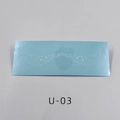 Close-up of waterproof gold freckle tattoo sticker U-03 with blue base and white dots - U-03 White Wave Dots