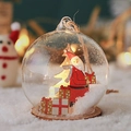 LED lighted glass Christmas ball ornament with hand-painted Santa and snow wood base - Santa Claus Round Side View