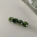 Top view of a glossy dark green acetate hair claw clip with four circular resin elements - Round Plate Duckbill Clip