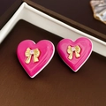 Close-up of pink heart earrings featuring gold bows and small sparkling crystals - Gold Plated/925 Silver Needle/Zirconia / Zirconia Bowknot Heart Studs (925 Silver Needle)